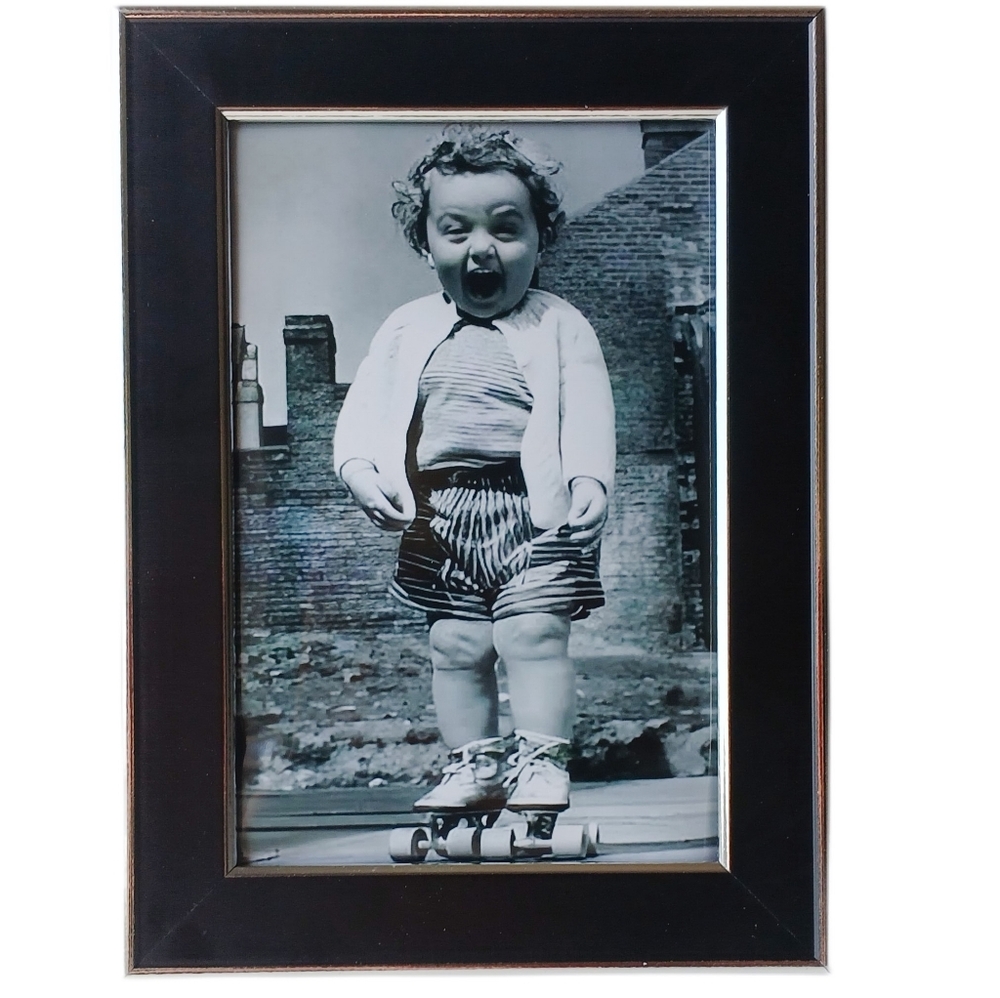 Vintage photo of little girl Super Cute roller skating Retro Baby child Toddler